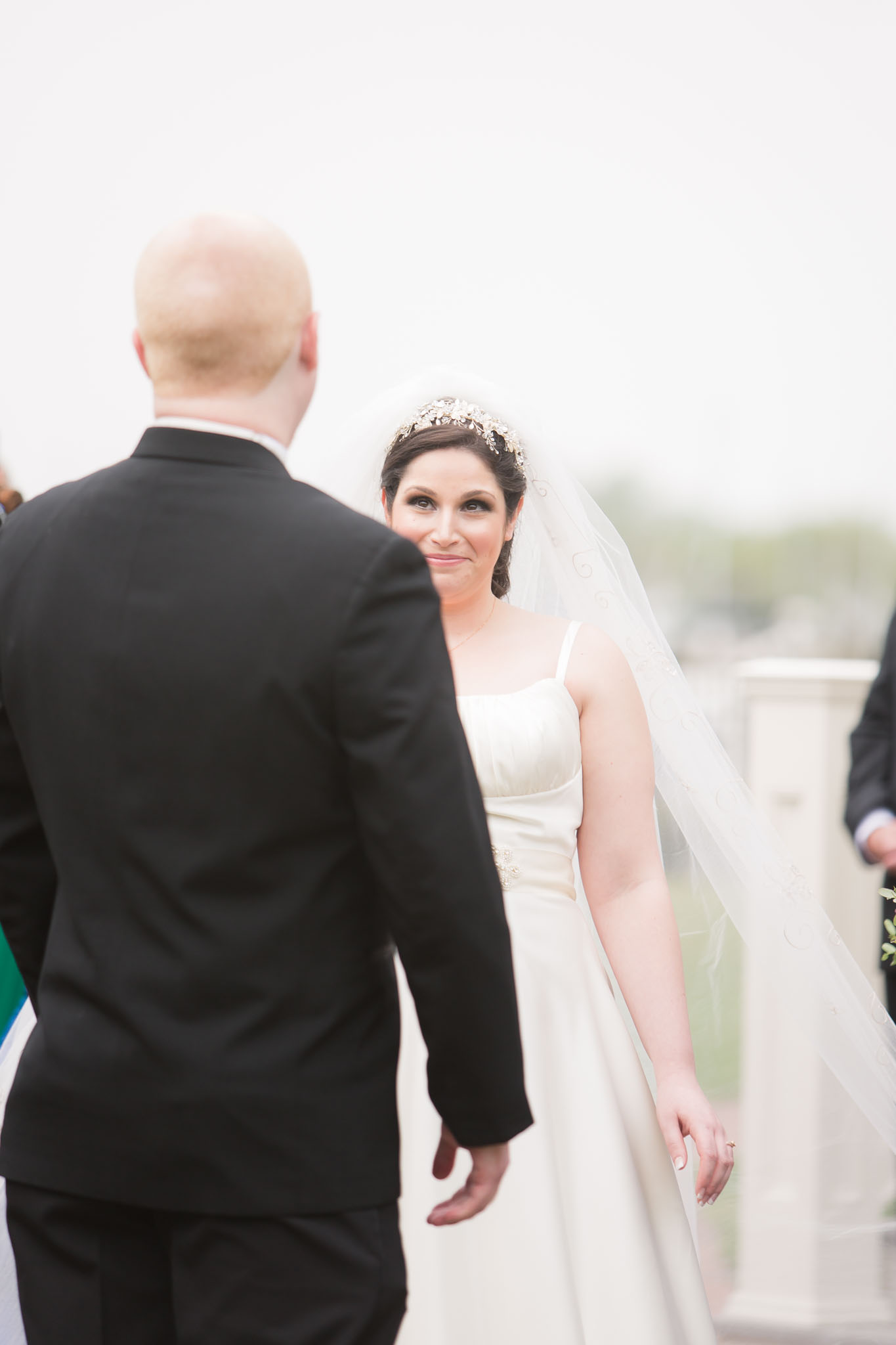 peacock themed wedding at clarks landing first look between bride and groom