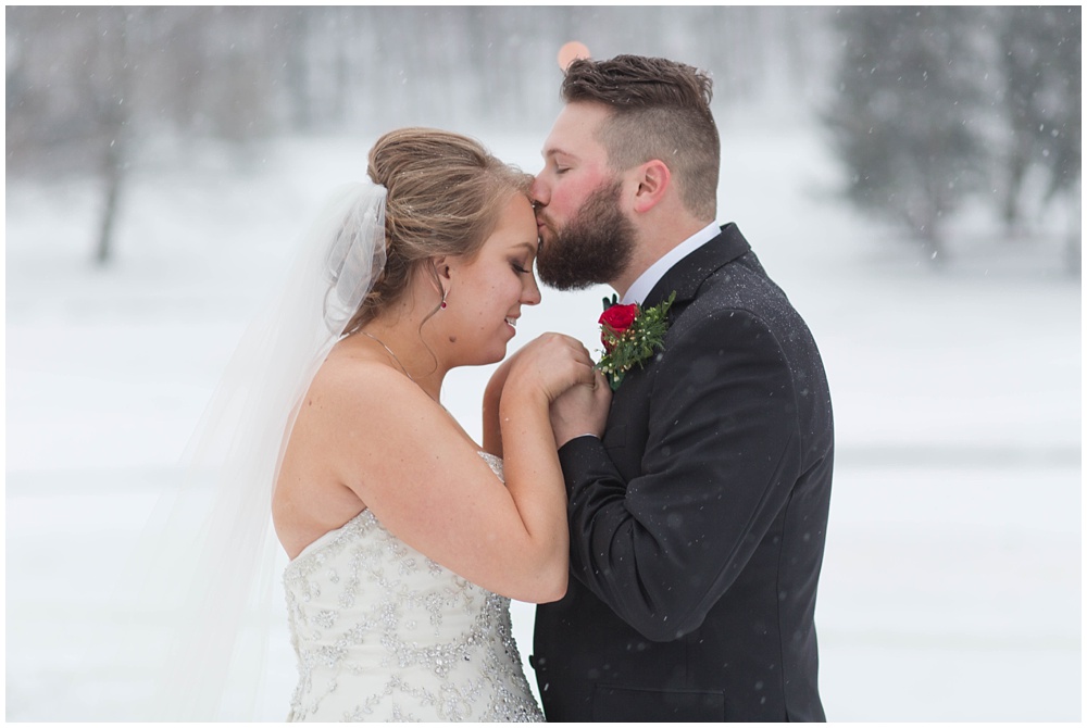 Snowy bride and groom portraits 