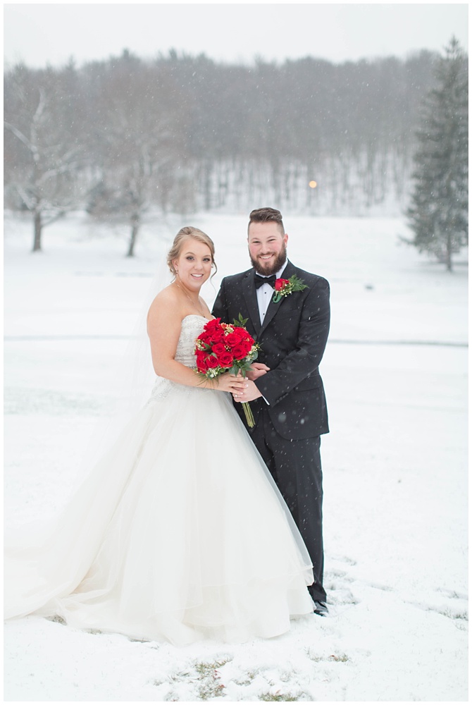 Snowy bride and groom portraits 