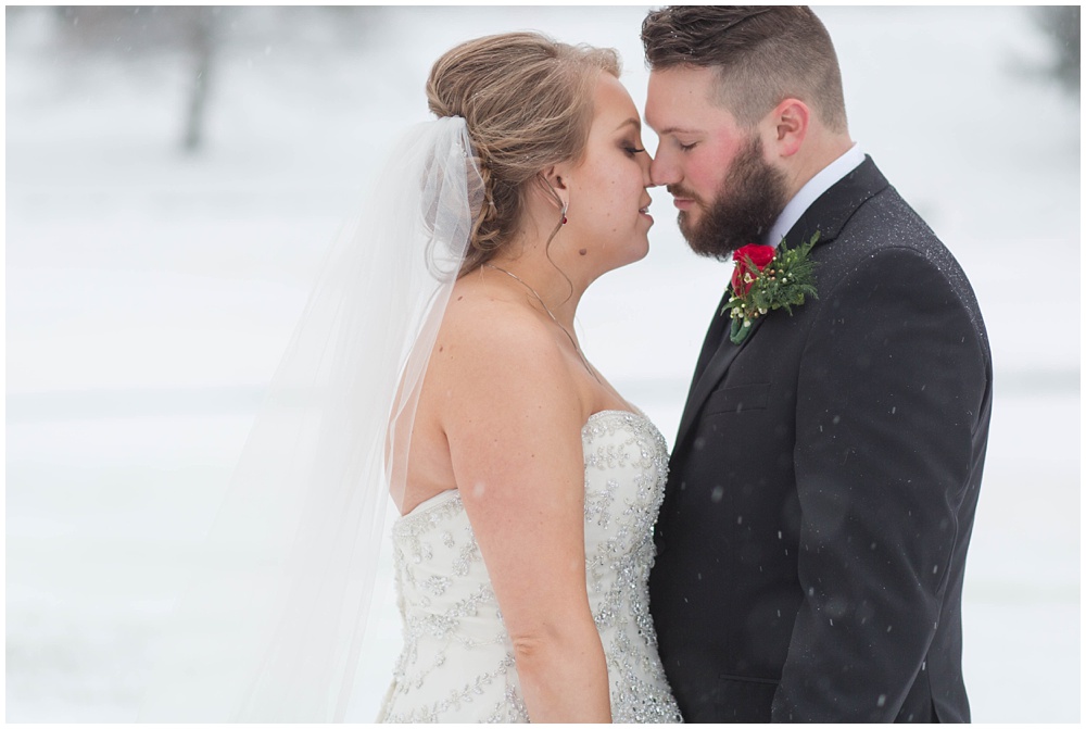 Snowy bride and groom portraits 