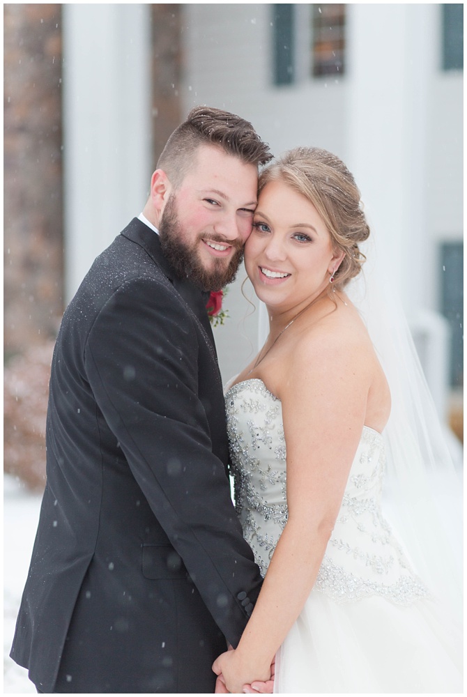 Snowy bride and groom portraits