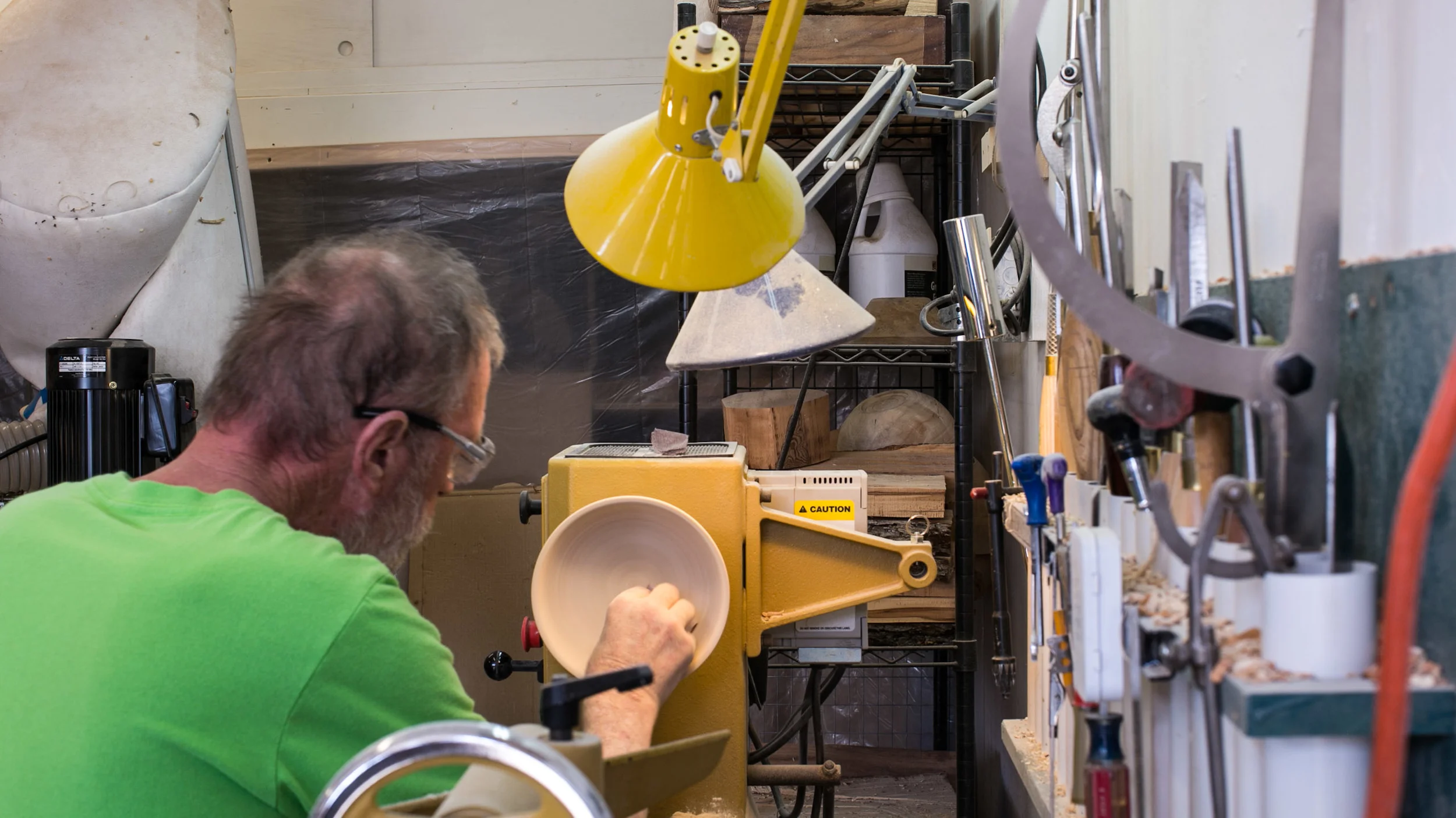 Hand sanding a bowl