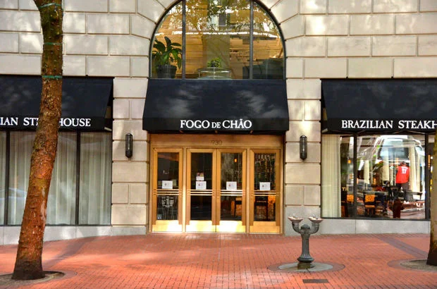 Now Open - Fogo de Chao, now with over 25 locations across the U.S. and Brazil, has opened the Portland restaurant in the former NikeTown location. The 8,500-square-foot, 250-seat restaurant, designed by Identity Architects, houses three private dining rooms, a glassed-in grilling area, a large salad bar display, bar, and the largest wine display in downtown Portland.