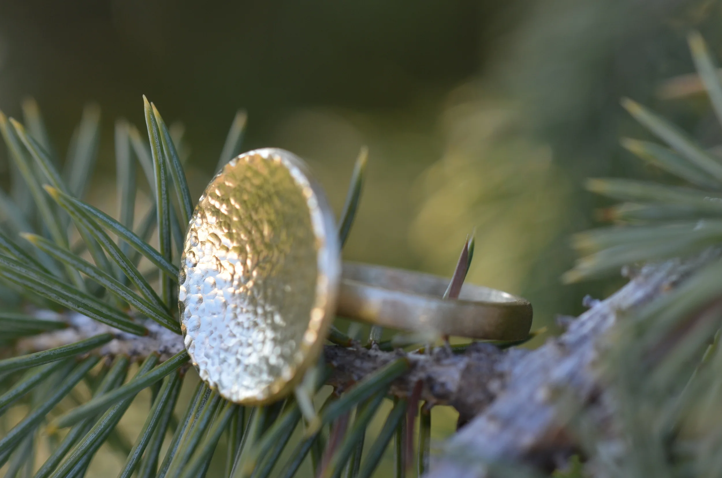 A hand-forged 18K yellow gold fashion ring. Elegant and simple.