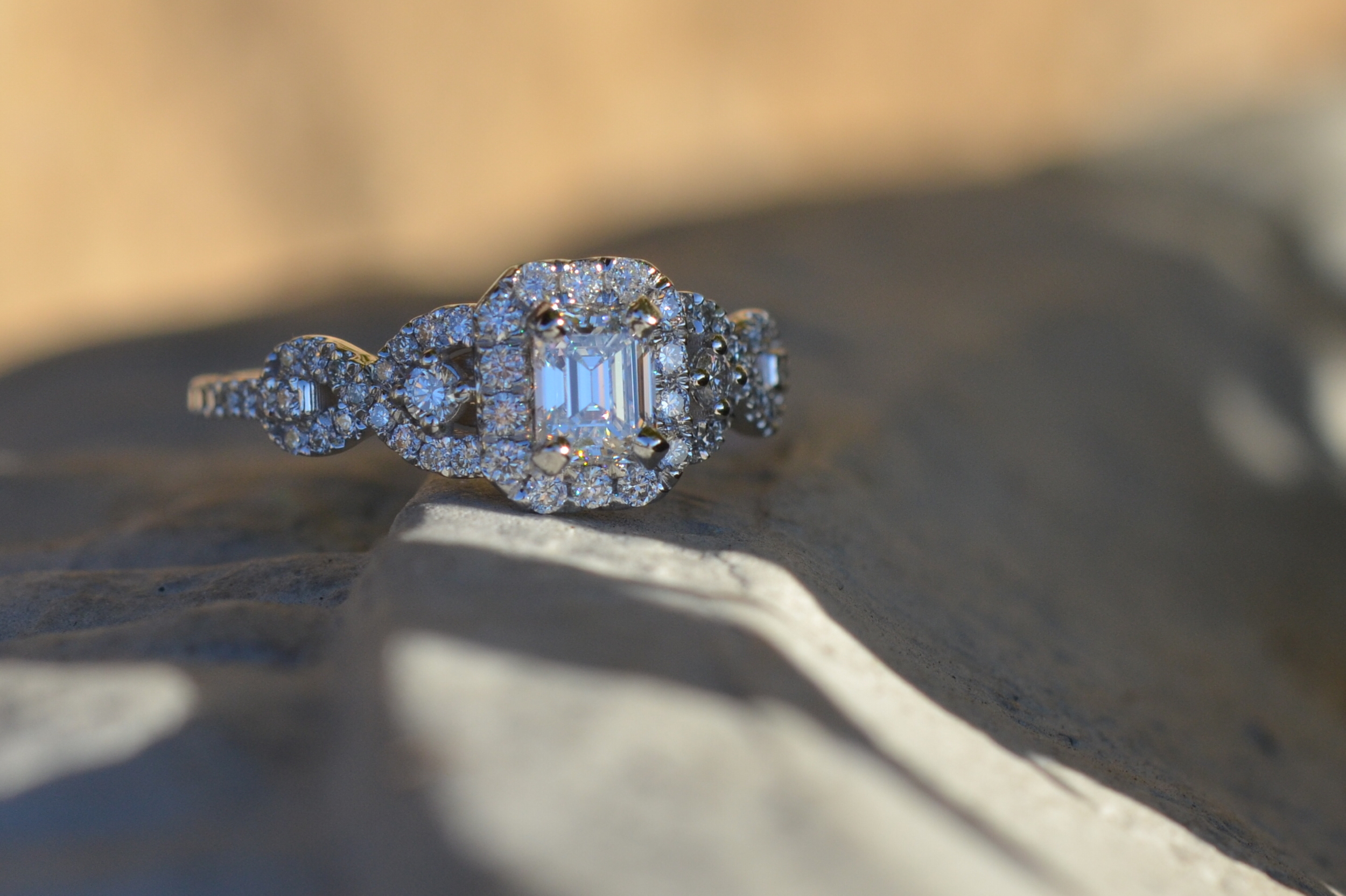 Graceful elegance. A custom-made diamond ring with Emerald Cut center.