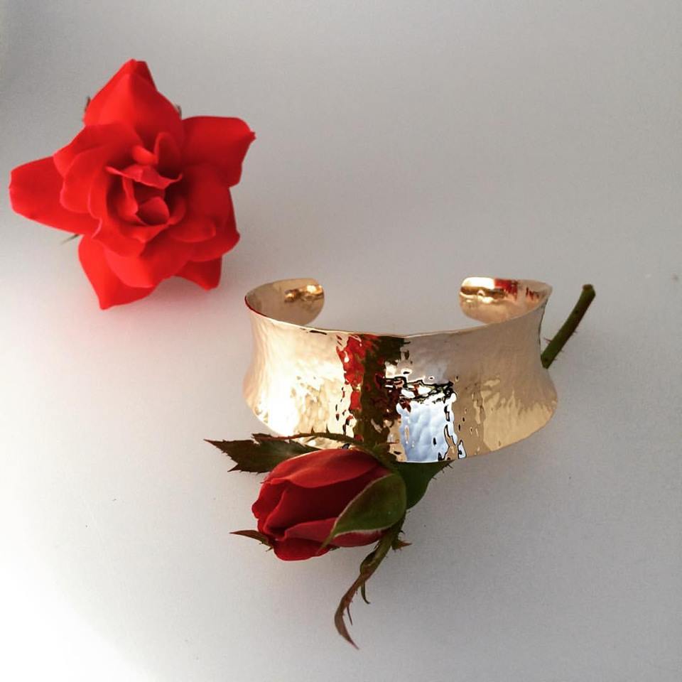 Hand forged cuff and roses.jpg