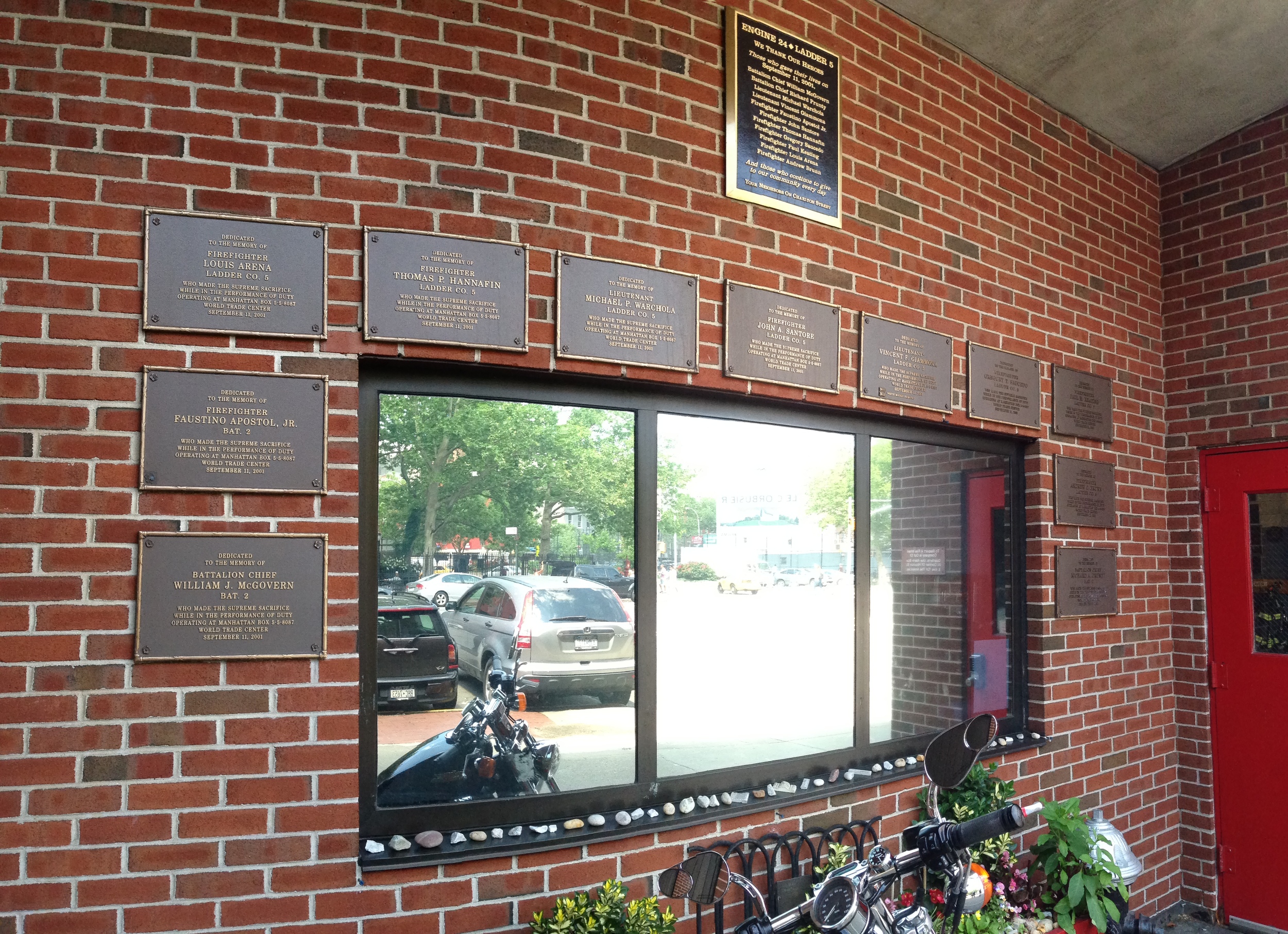  Outside a NYC fire station with plaques of fallen heroes. 