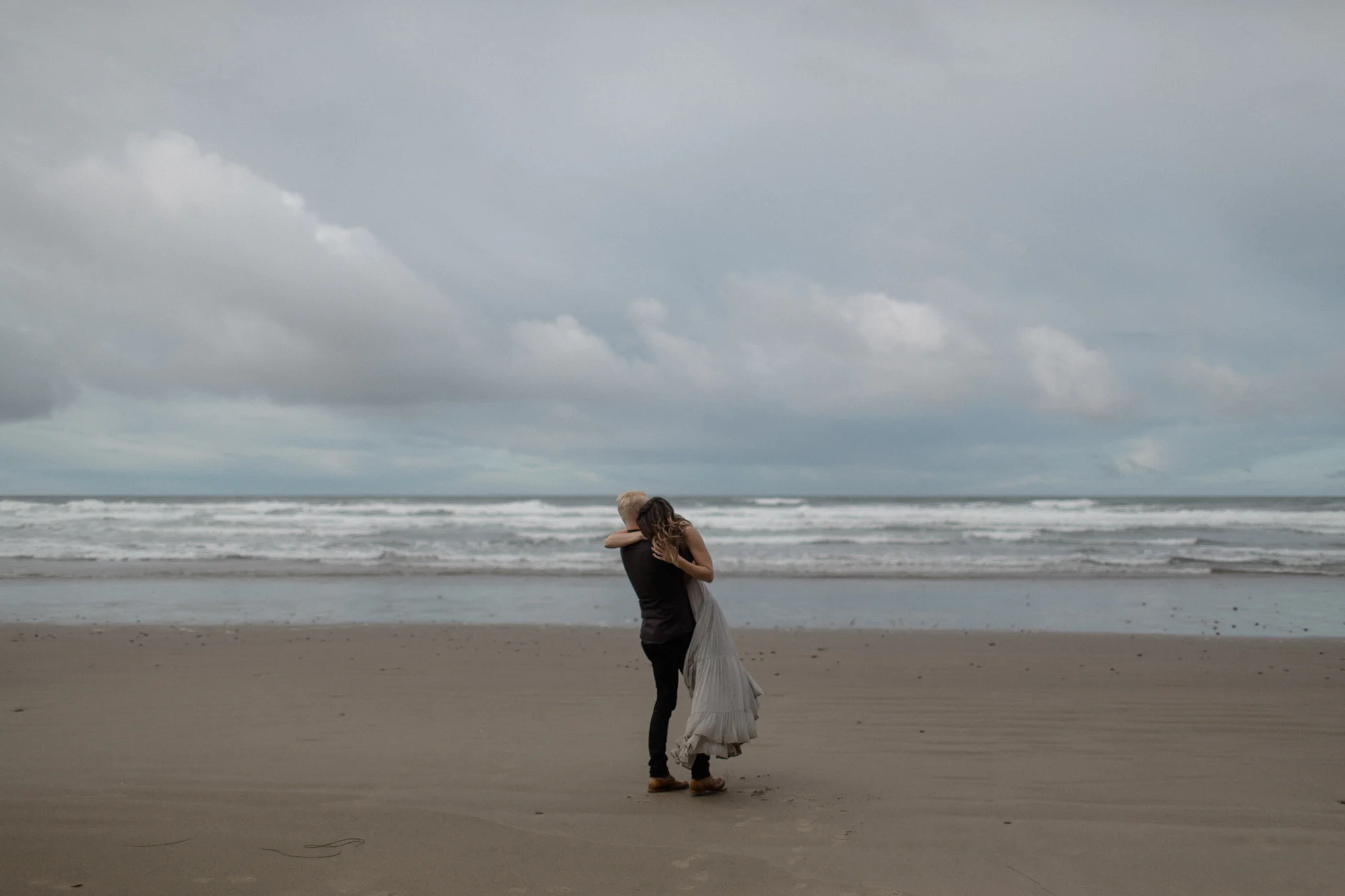Oregon coast engagement session at cannon beach and ecola state park destination travel photographer sarah rose walk