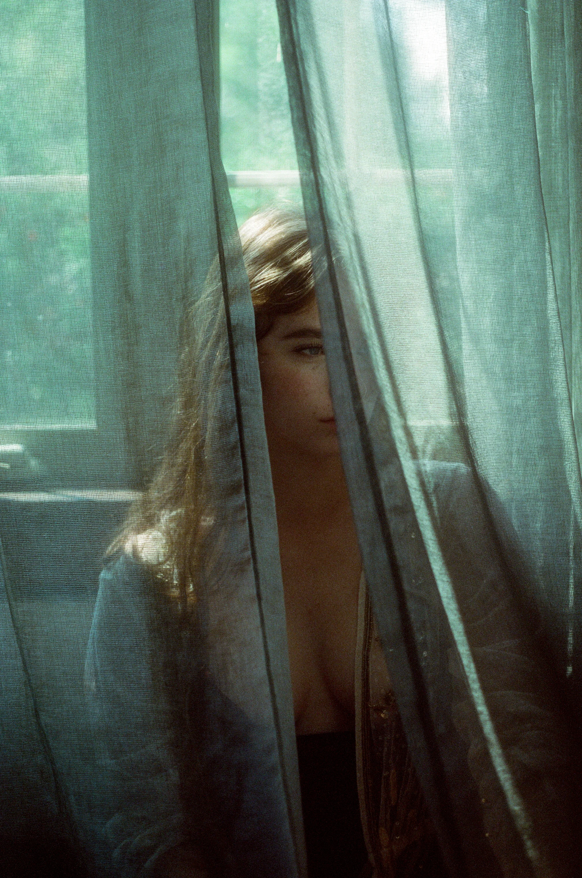 35mm film portrait. lingerie editorial. moody boudoir. canon ae-1. cinestill 800. moody portrait. emotional portrait. ohio portrait photographer. sarah rose photography. i am sarah rose. 