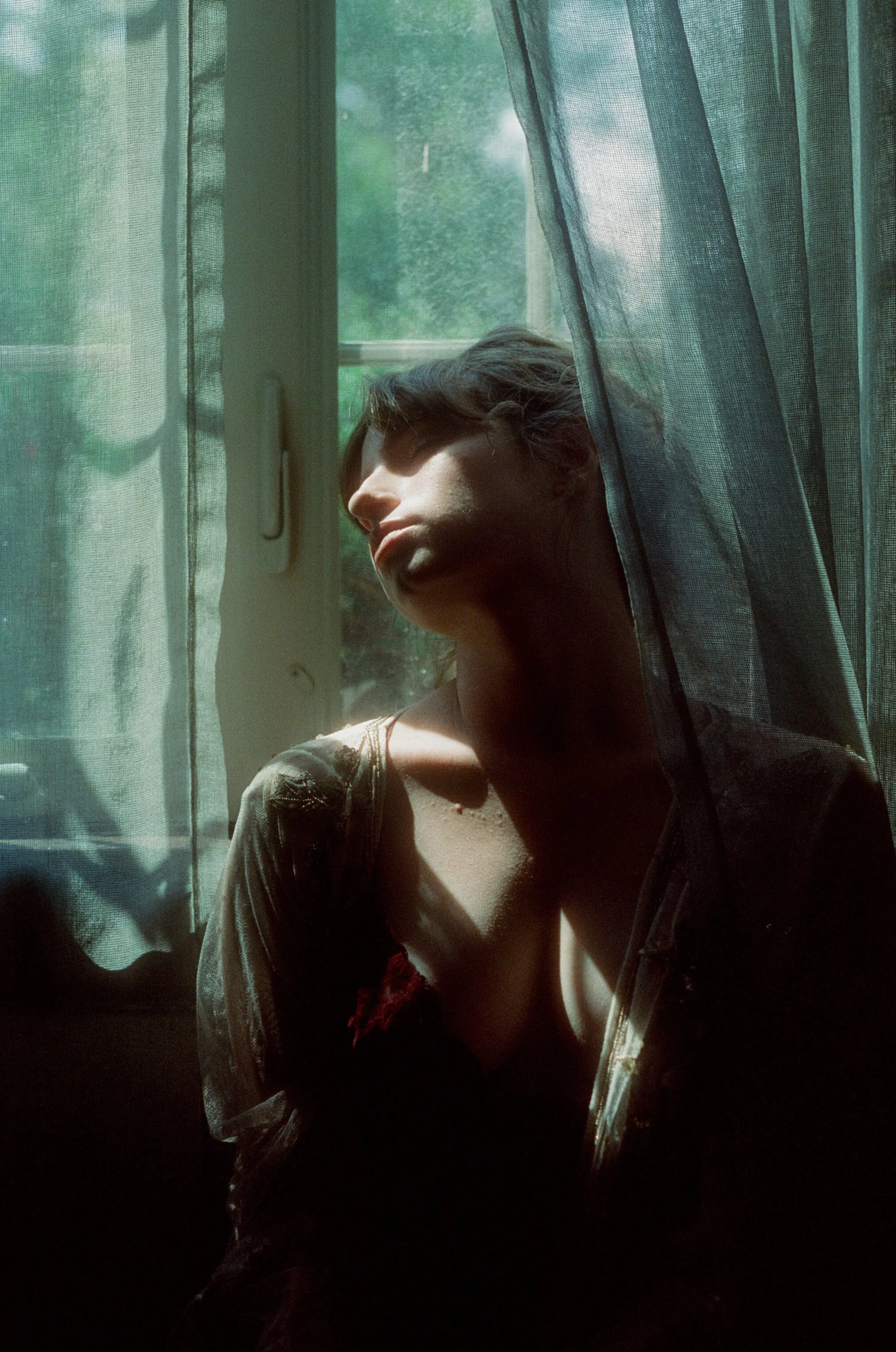 A 35mm portrait of Hana on Cinestill 800t film by Sarah Rose