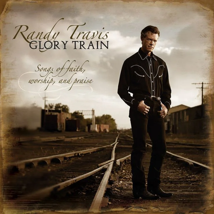 A wonderful understated version of He's Got The Whole World in His Hands can be found on this Randy Travis recording.