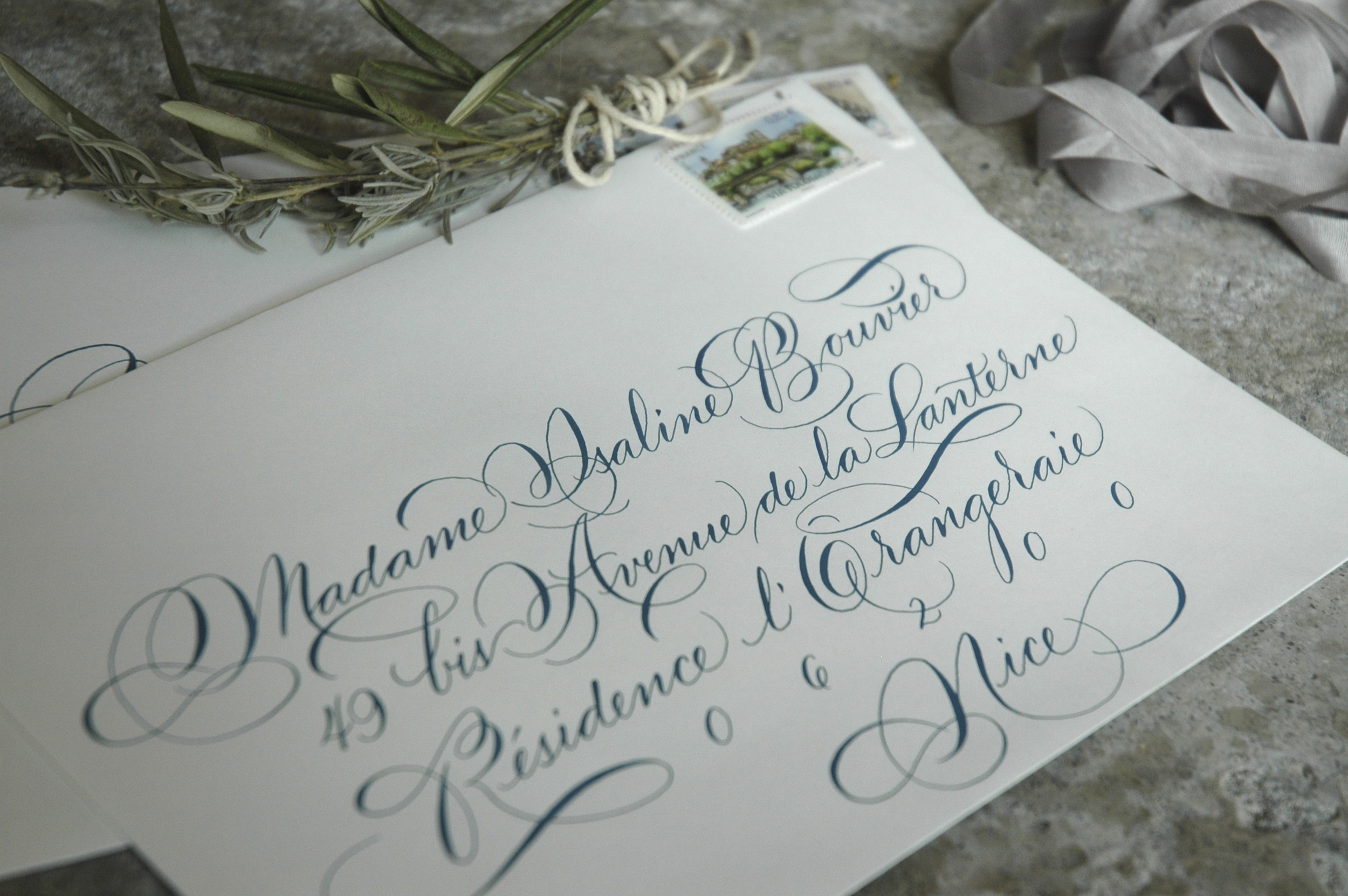 calligraphy letterpress invitation suite in shades of blue