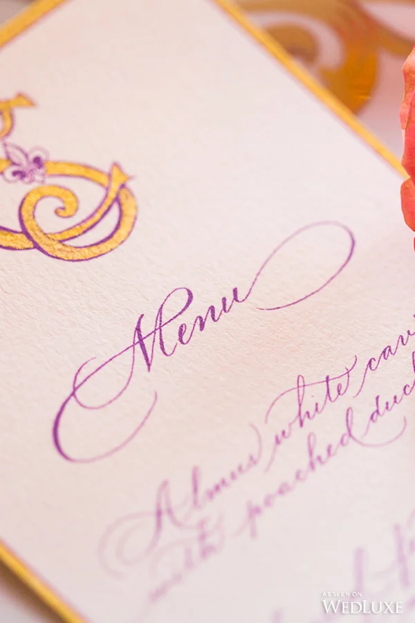 Gold and purple calligraphy monogram menu by Joy Fairclough for Studio French Blue, for the Shangri-La Hotel, Paris
