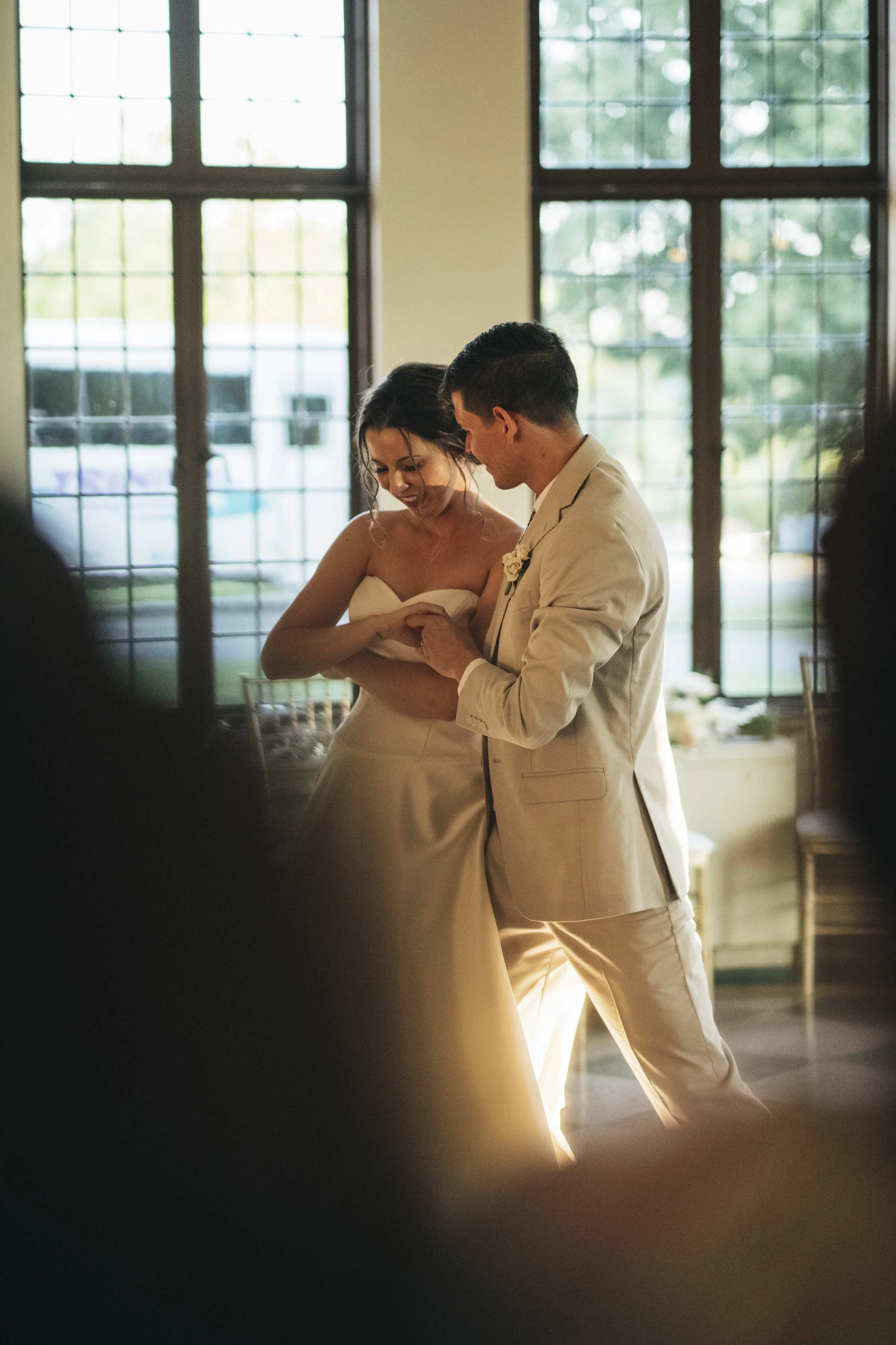 Bride and groom dance for the first time at their reception. 