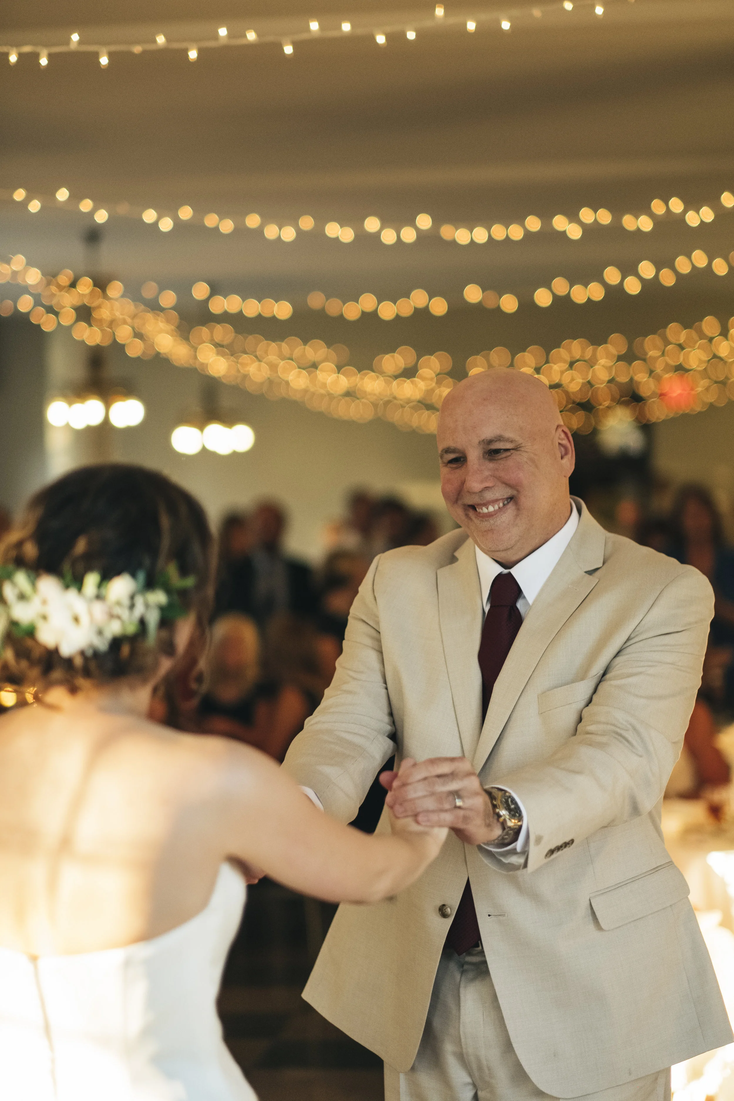 Father and daughter share in a first dance at Nazareth Hall wedding reception.