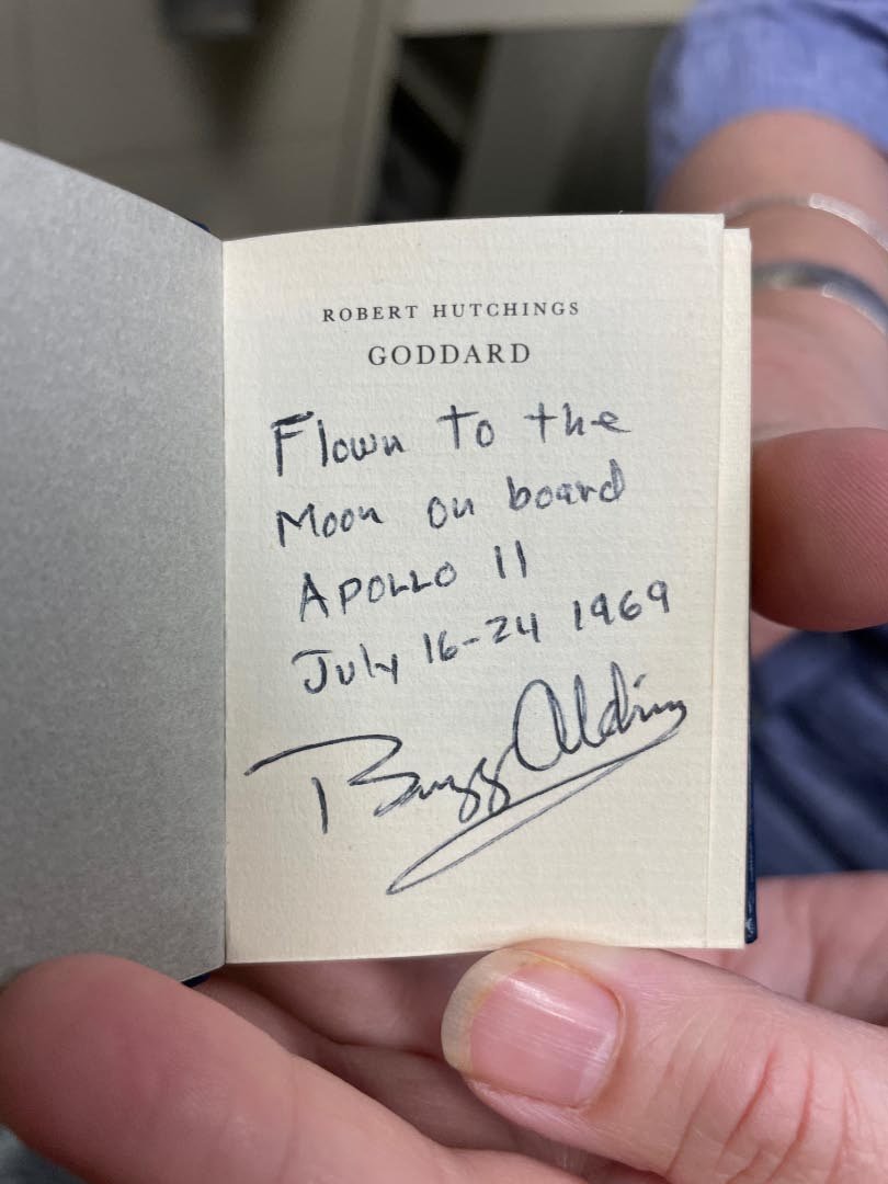 Title page from Robert Goddard Biography, with note "Flown to the Moon on board APOLLO 11 July 16-24 1969, signed by Buzz Aldrin