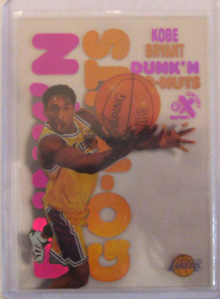 1998-99 Skybox E-X Century Dunk 'N' Go Nuts: This is another one to file under the "Who came up with this idea?" heading.Did the people at Dunkin' Donuts approach the card company? Did the card designer think it was a funny parody? Skybox certainly seemed to have a sense of humour with some of its designs, and it makes for a fun insert.