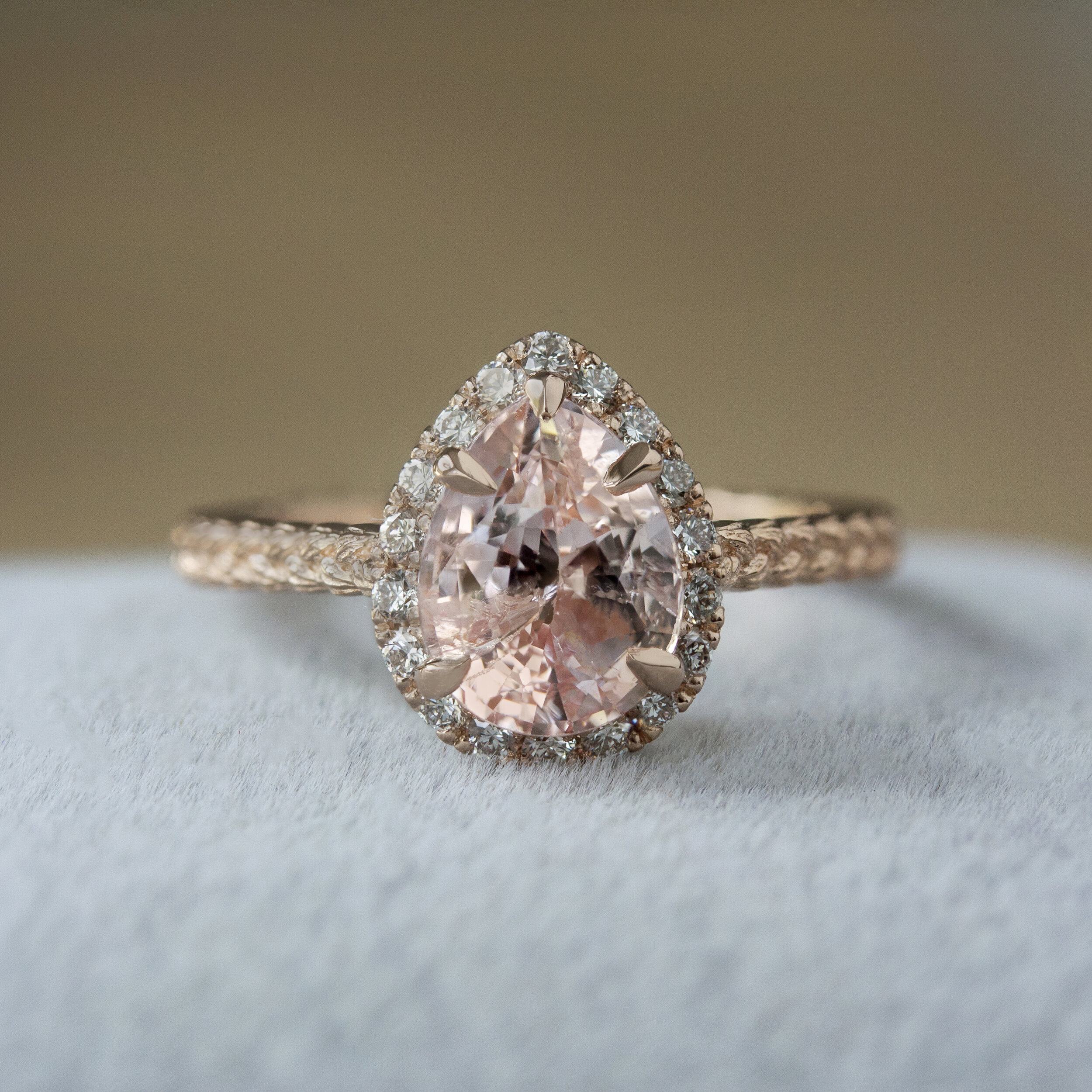 Custom Pear Shaped Peach Sapphire Halo Ring with Organic