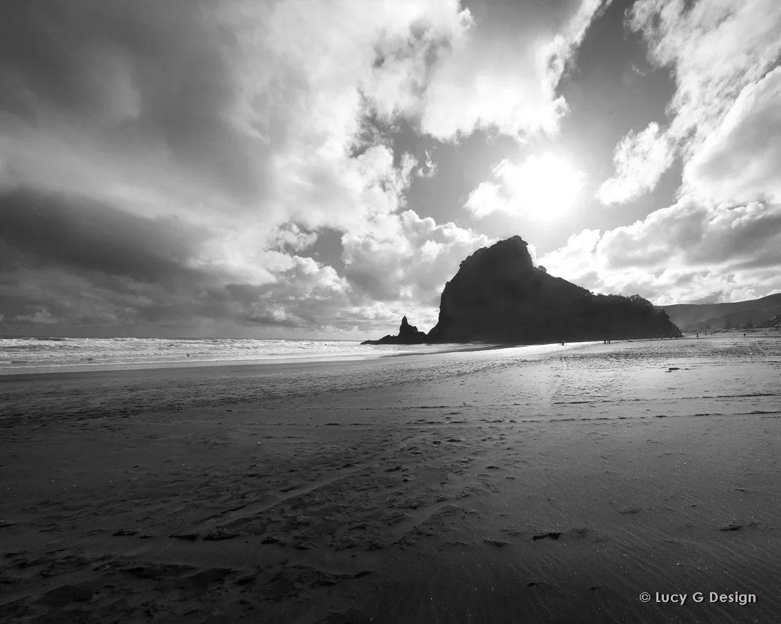 'Lion Rock Piha' b/w 60x75cm glass wall art