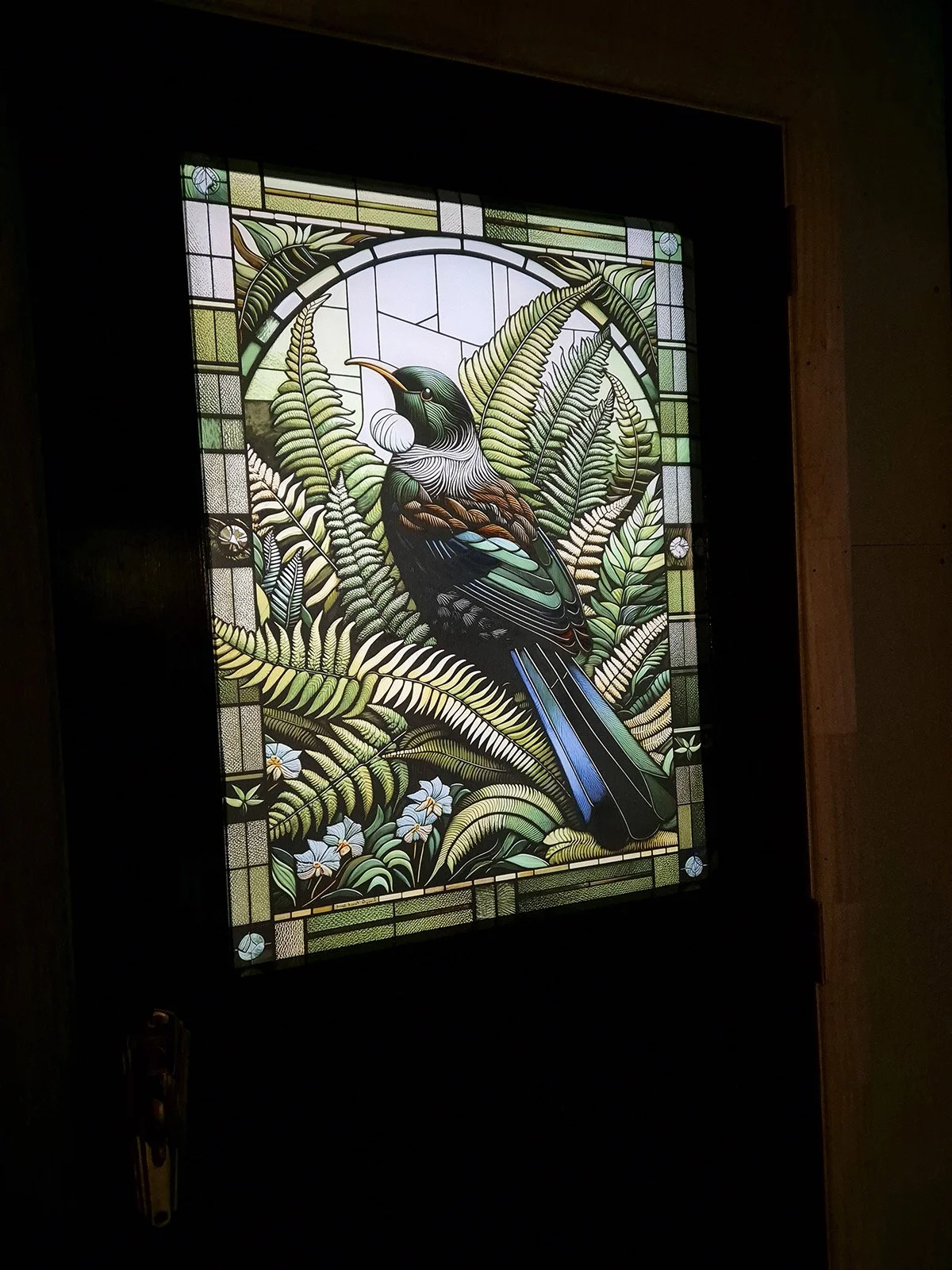 stained glass tui printed front door and sidelight panels.jpg