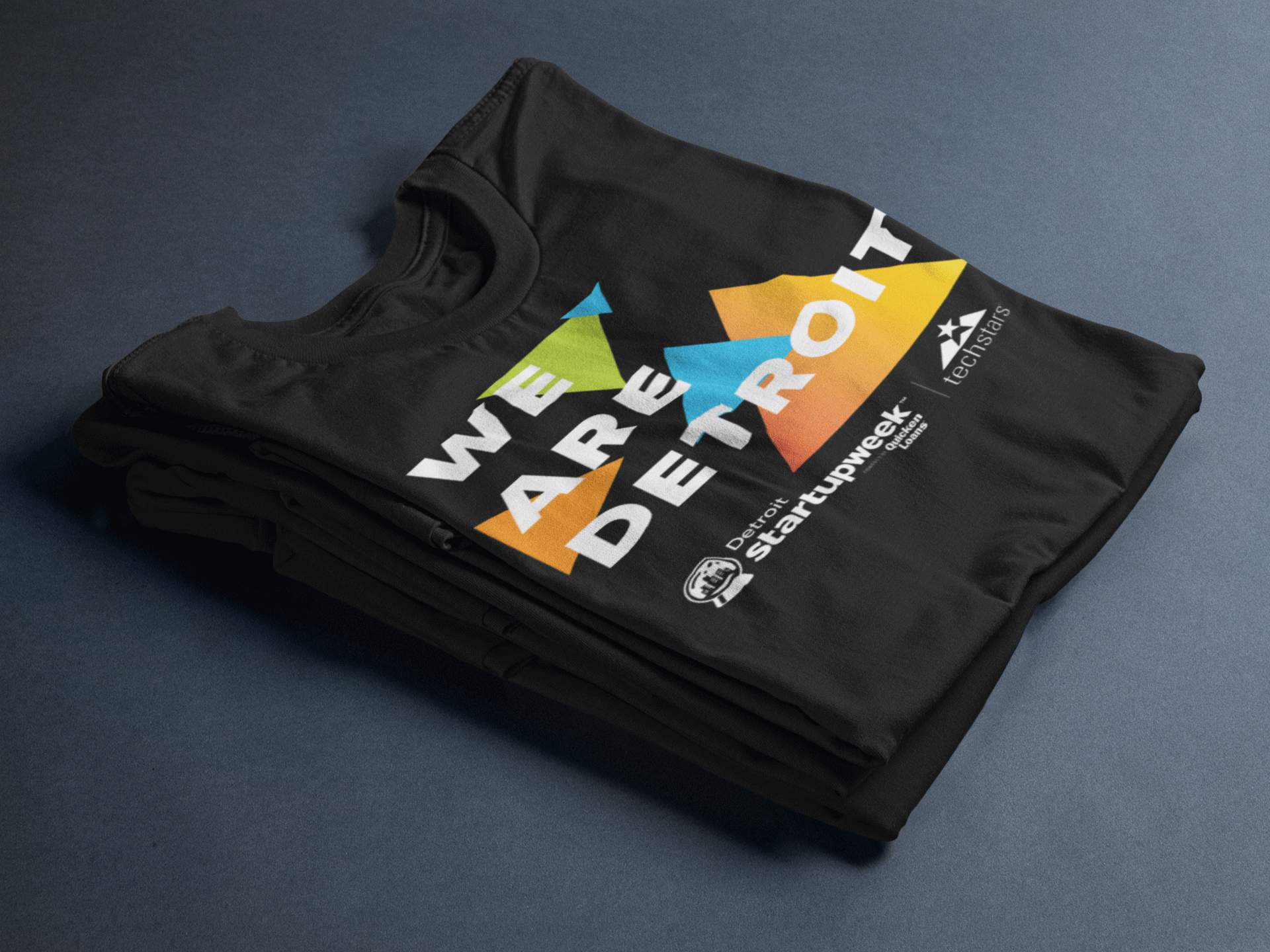 t-shirt-mockup-folded-over-two-tees-on-a-table-a17241.png