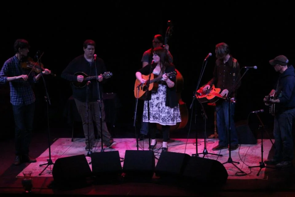 Photo courtesy of Gabe Spencer. Grits & Soul play The Isis bluegrass jam, (c) 2013. Julian Pinelli, John, Anna, Dakota Waddell, Jackson Dulaney, & Bradley "Chum" Carter.