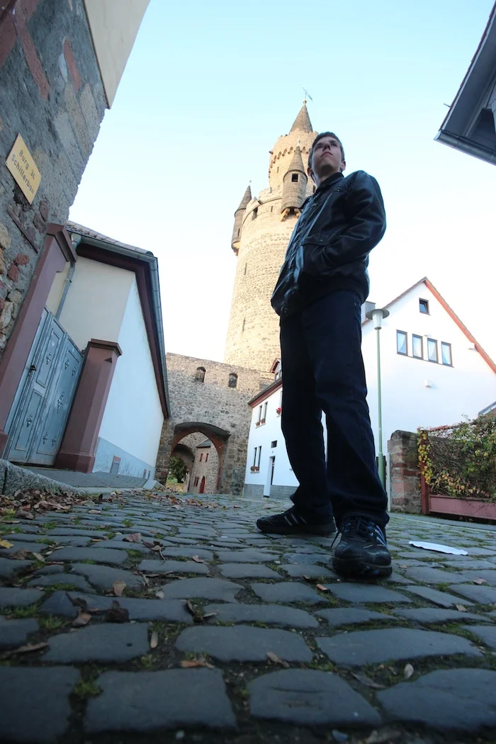 Robbie in front of the Tower at Friedberg