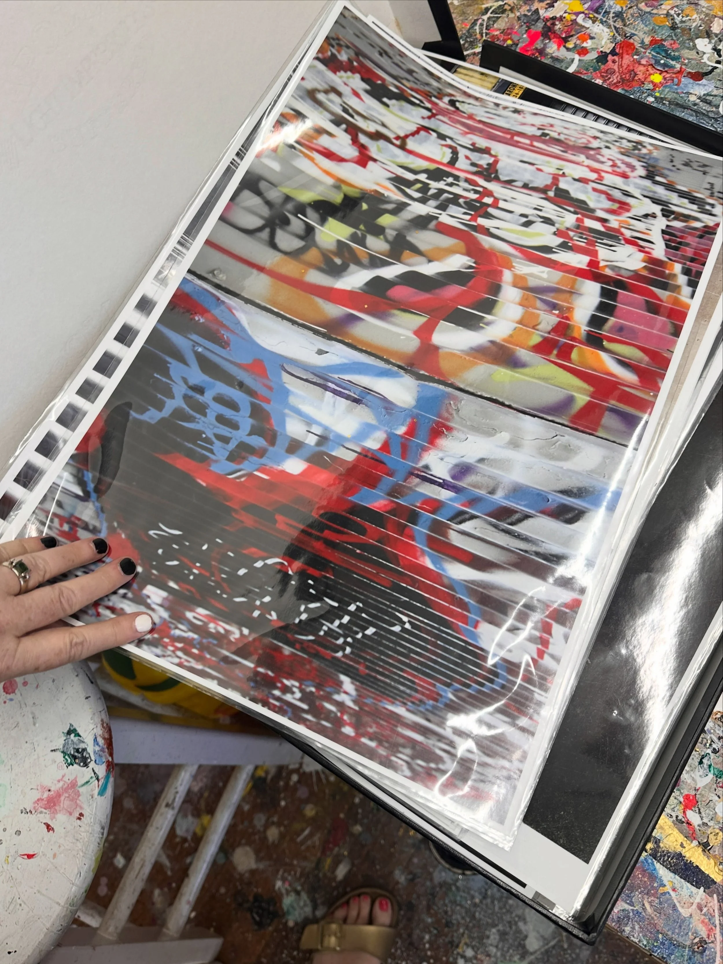 Some of my photographs! Excuse the sheen from the slipcovers on these prints because I laid them out on my painting table. These are mostly 13&rdquo;x19&rdquo; prints on gloss coated Epson photo paper. They were taken on my SLR Canon 5D Mark II camer