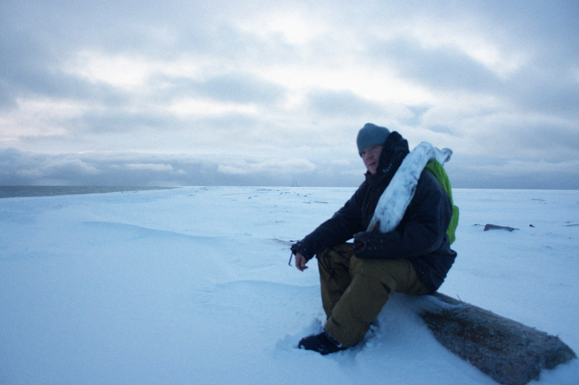 siting on a log on mofen Island.jpg