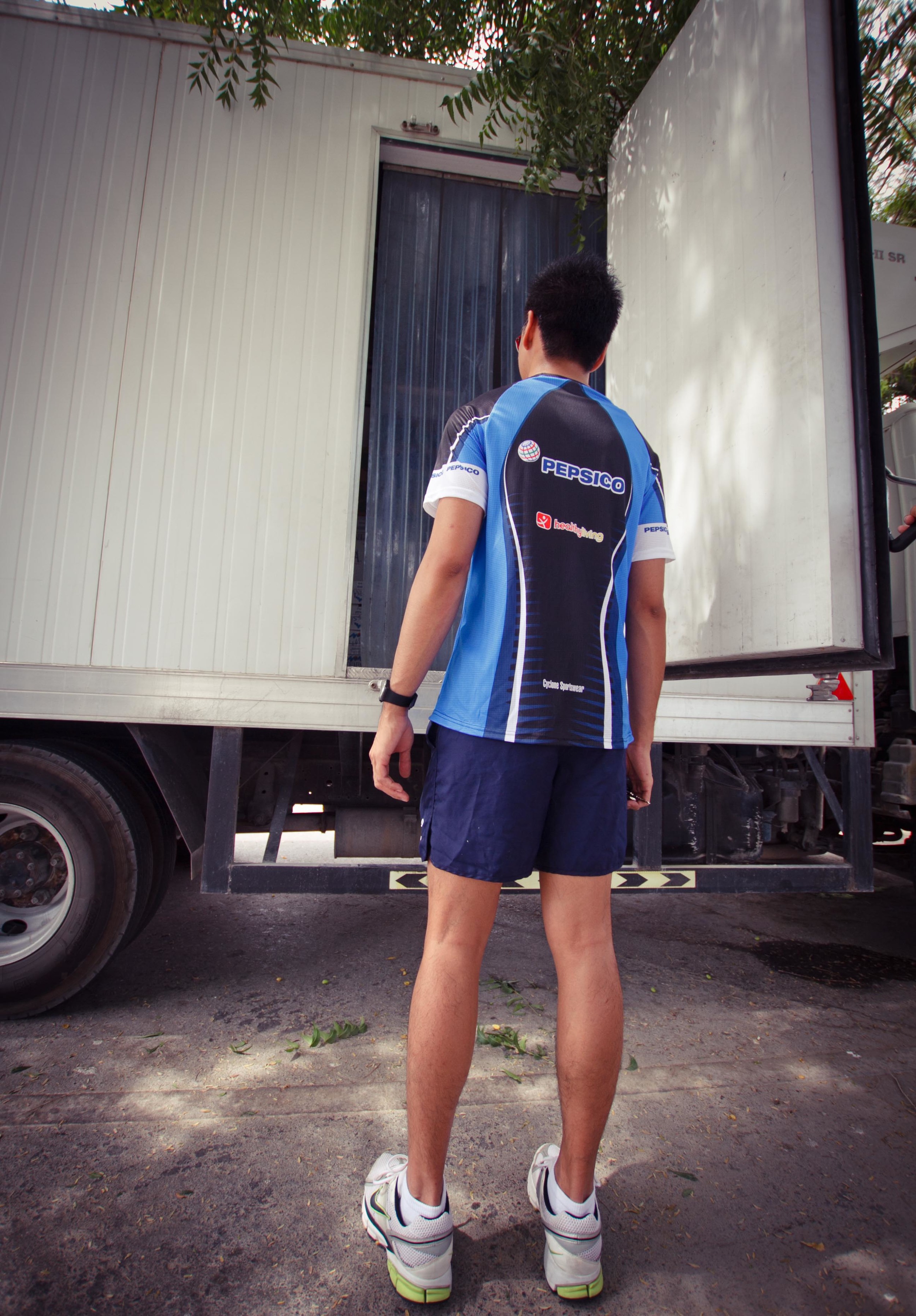  PepsiCo Volunteer, preparing to pack the cars with Water packs. 