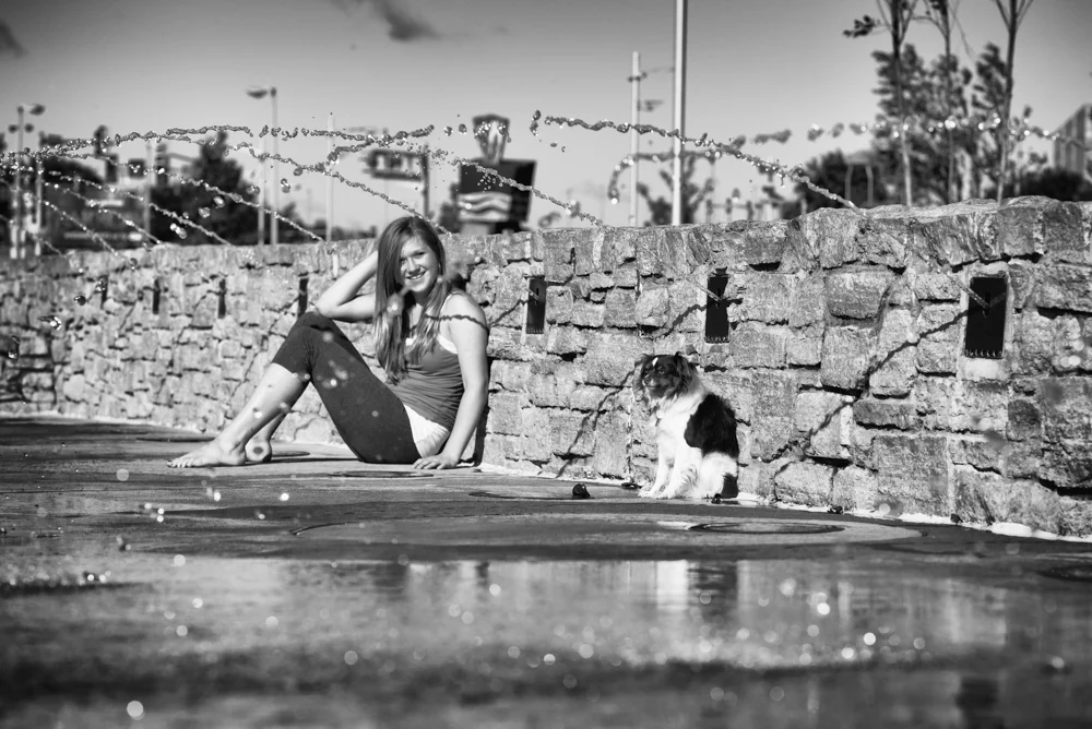 Rascal and Carin in a fountain in Rock Island 