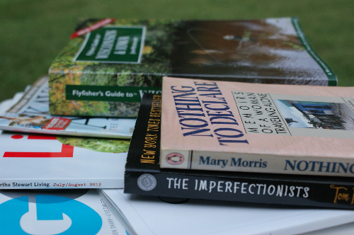 GQ, Martha, a stack of fly fishing mags and the most read book in our home: fishing in WI and IA. 