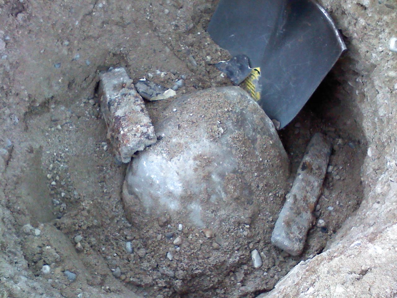 1/16th Corner Stone with flat iron fragments and pieces of broken crockery, Section 14, Riverton Township, Mason County, recovered in August 2013