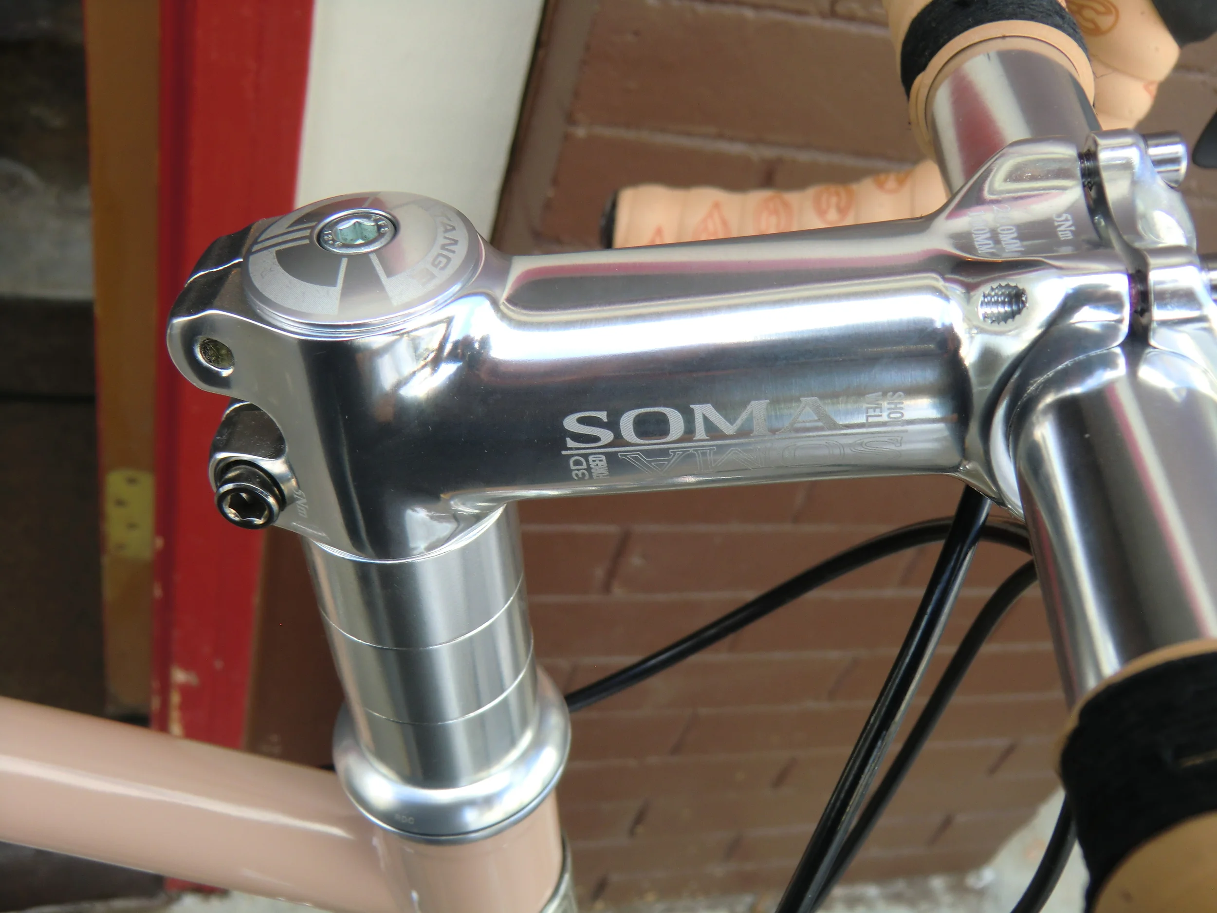 Soma stem and fork with Tange headset are stock items. Cinelli Gel Cork tape a custom touch.