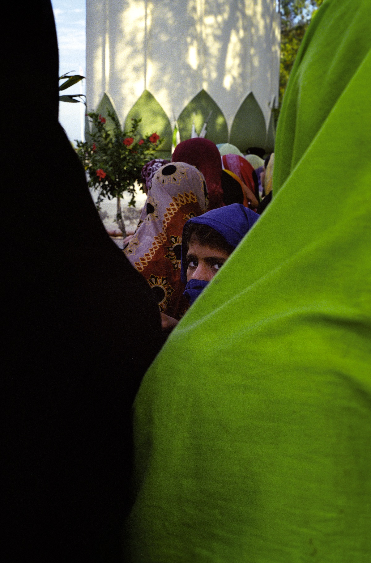 The Radcliffe Line documents memory and ritual in the context of border-making through the lens of Partition survivors in Punjabi Pakistan and India. At 21 years old I traveled along the Punjab border of Pakistan and India. I documented war stories from survivors from the 1947 partition of India and the consequences of colonial boundary-making. The actual Radcliffe Line, which tore through shrines and neighborhoods, was drawn by one Sir Cyril Radcliffe. A seasoned lawyer, Radcliffe had no experience in cartography nor had he ever stepped foot in India before he was tasked with drawing the border that would divide land and faith.