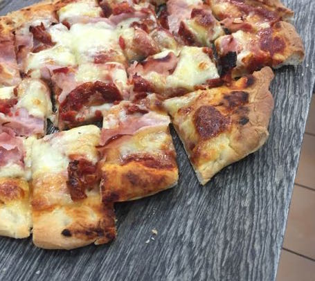 Cannot resist a piece of pizza
