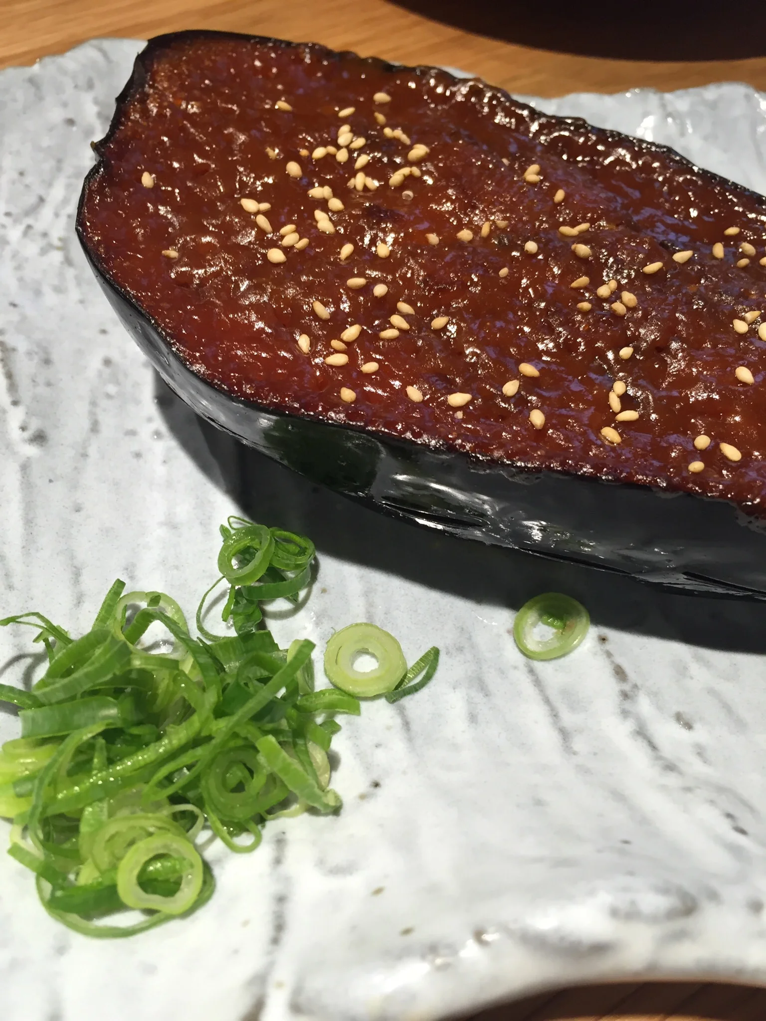 Roasted until tender and succulent with dengaku miso & sesame