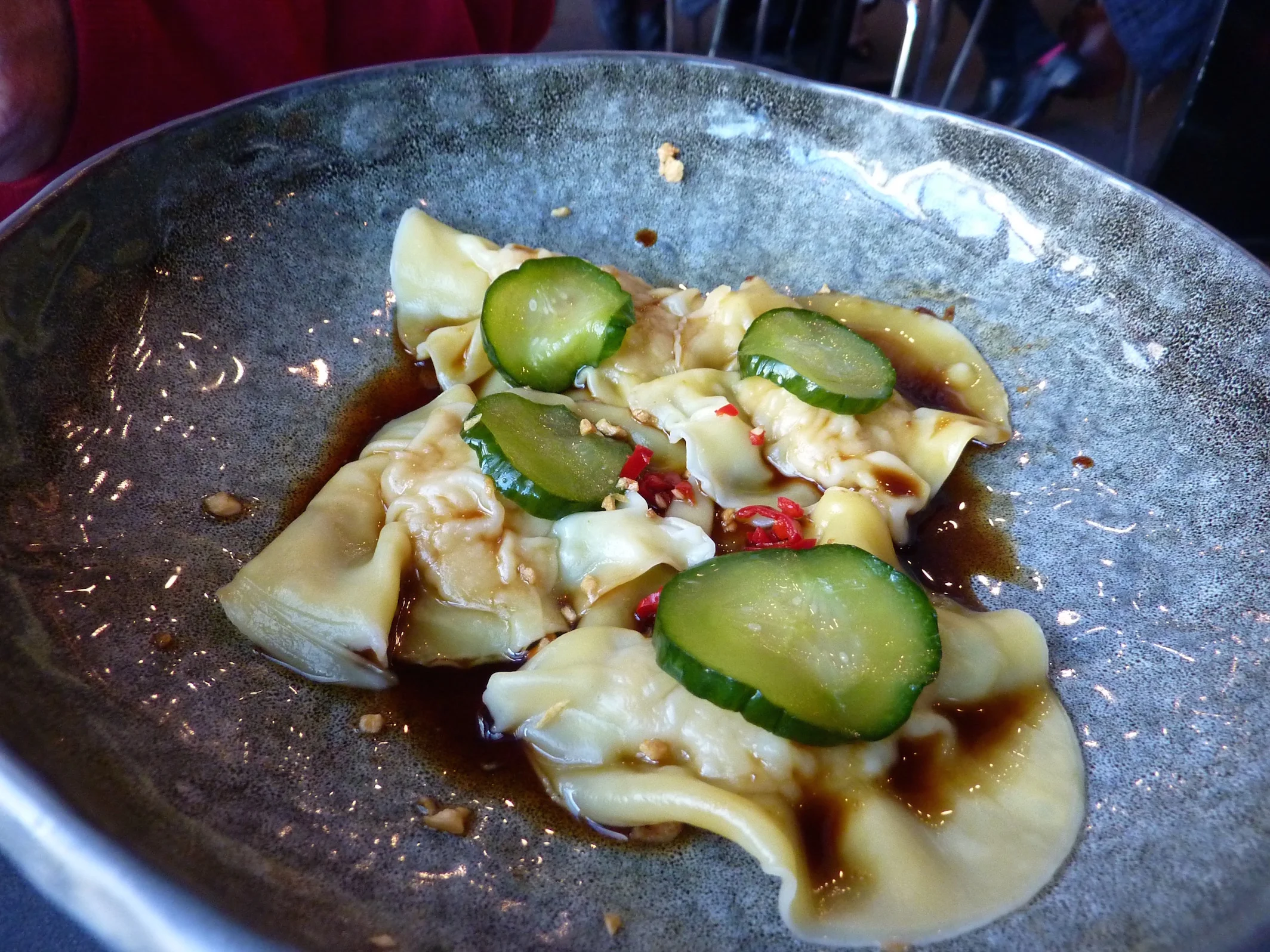 Delicate prawns dumplings with soy and pickle