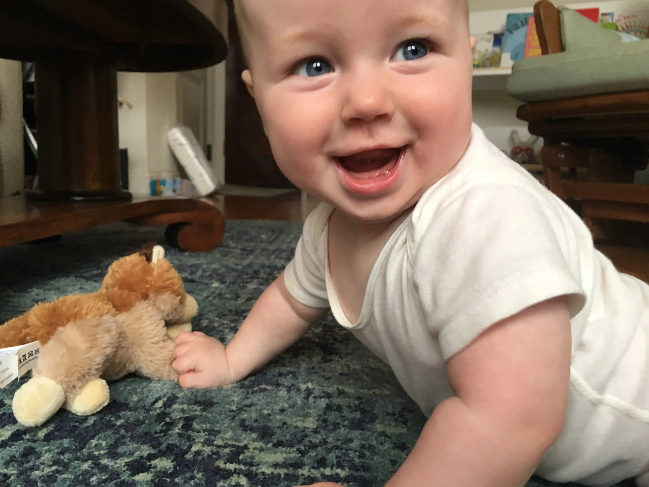 With "Cal" the coyote, his favorite toy.