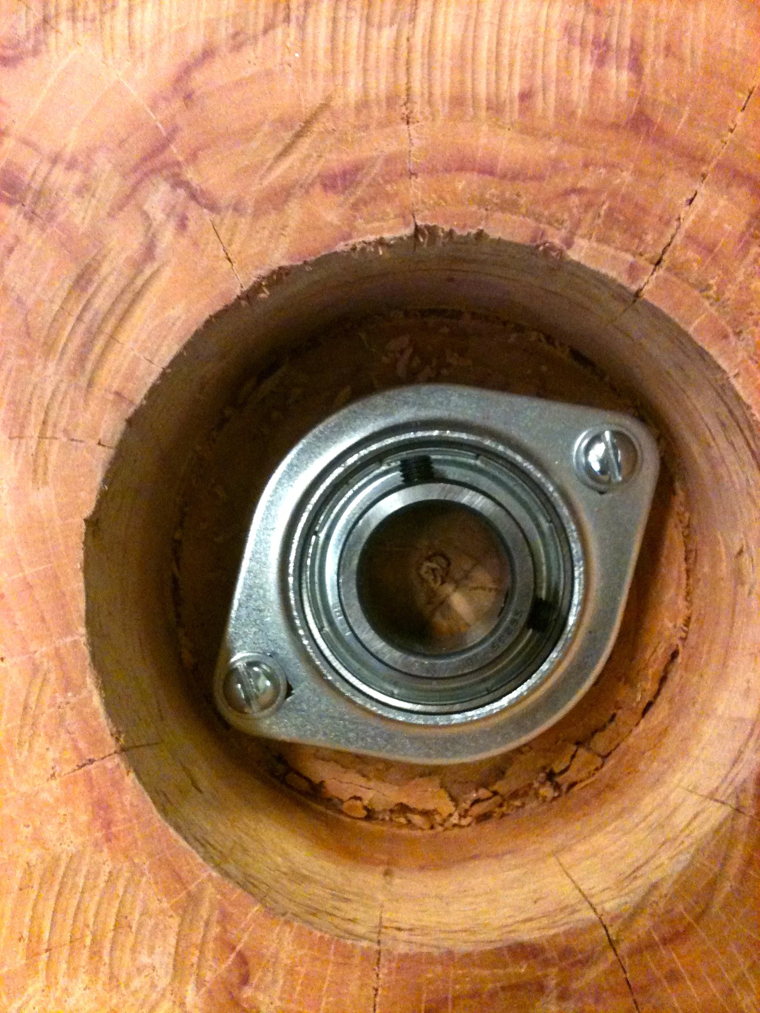 Dropping the ball bearings into the bore hole.