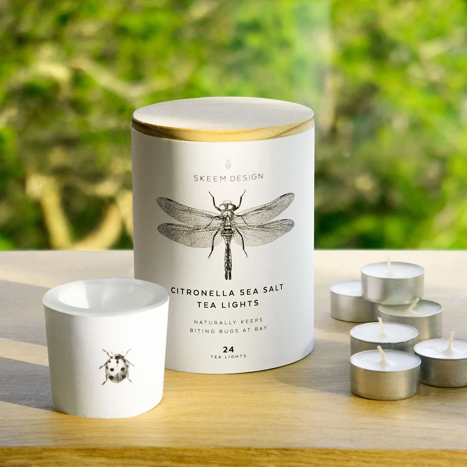 citronella.tea.lights.window.jpg