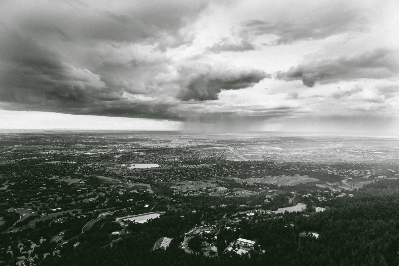 Rain over The Springs. This is the view from the Will Rodgers Shrine of The Sun, located right above the Cheyanne Mountain Zoo. 