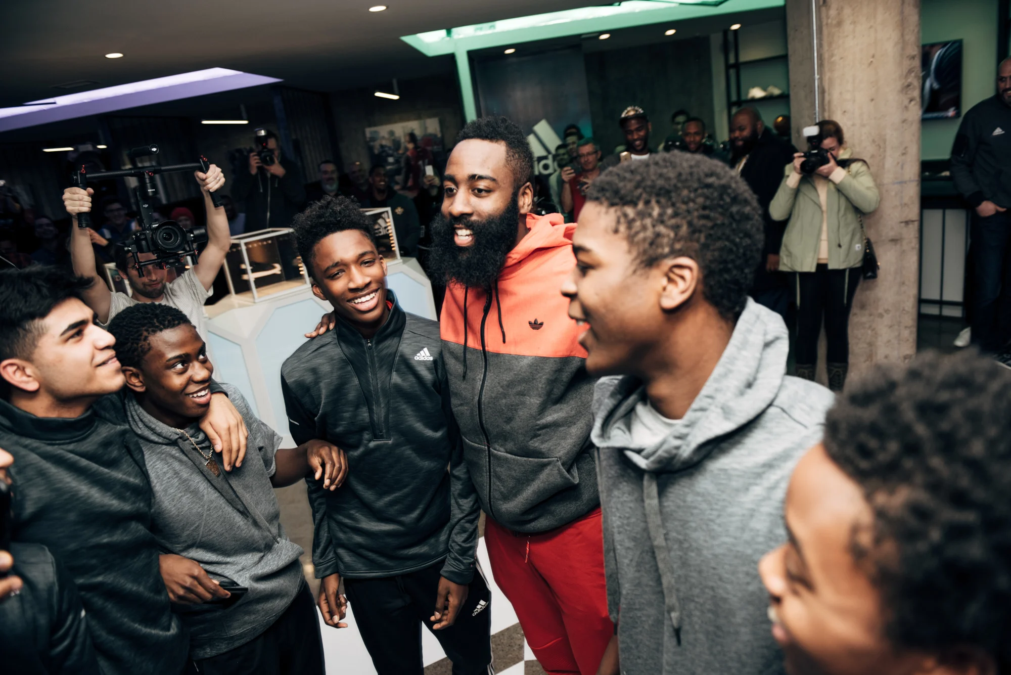 Houston Rocket's James Harden surprises a group of local high schoolers at the adidas product vault. 