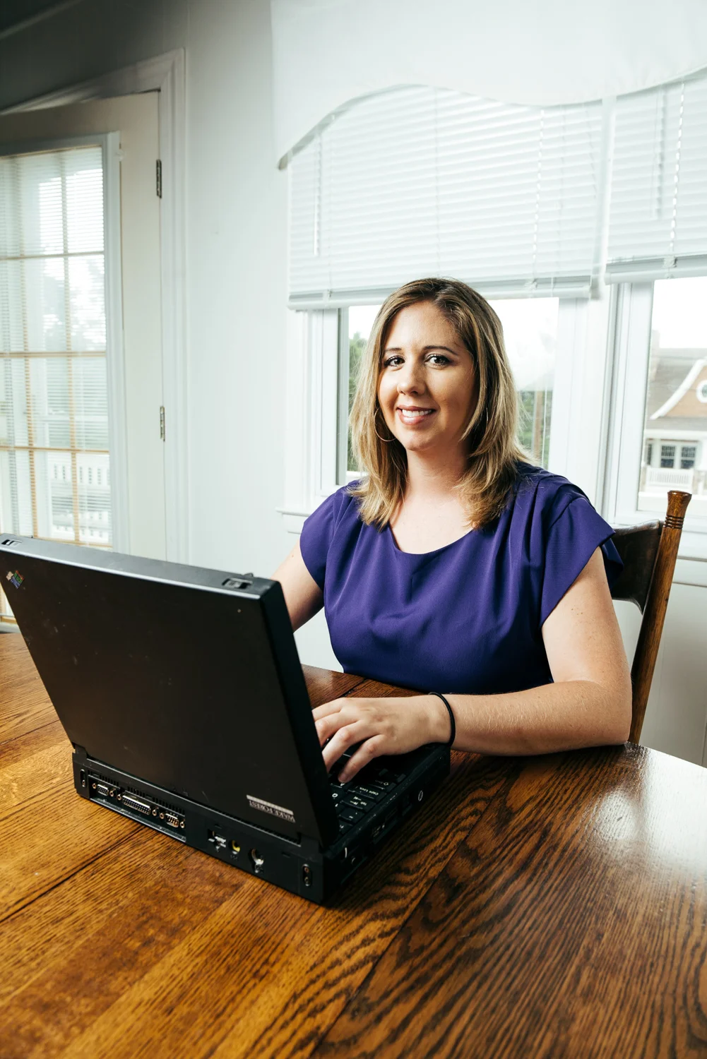 Jen with her 15 yr. old 6.5 lb IBM ThinkPad 365XD, the first generation of laptops distributed by Wake Forest to incoming students. 