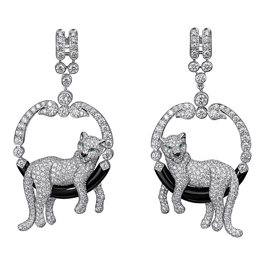 Cartier panther earrings in diamond and emerald.