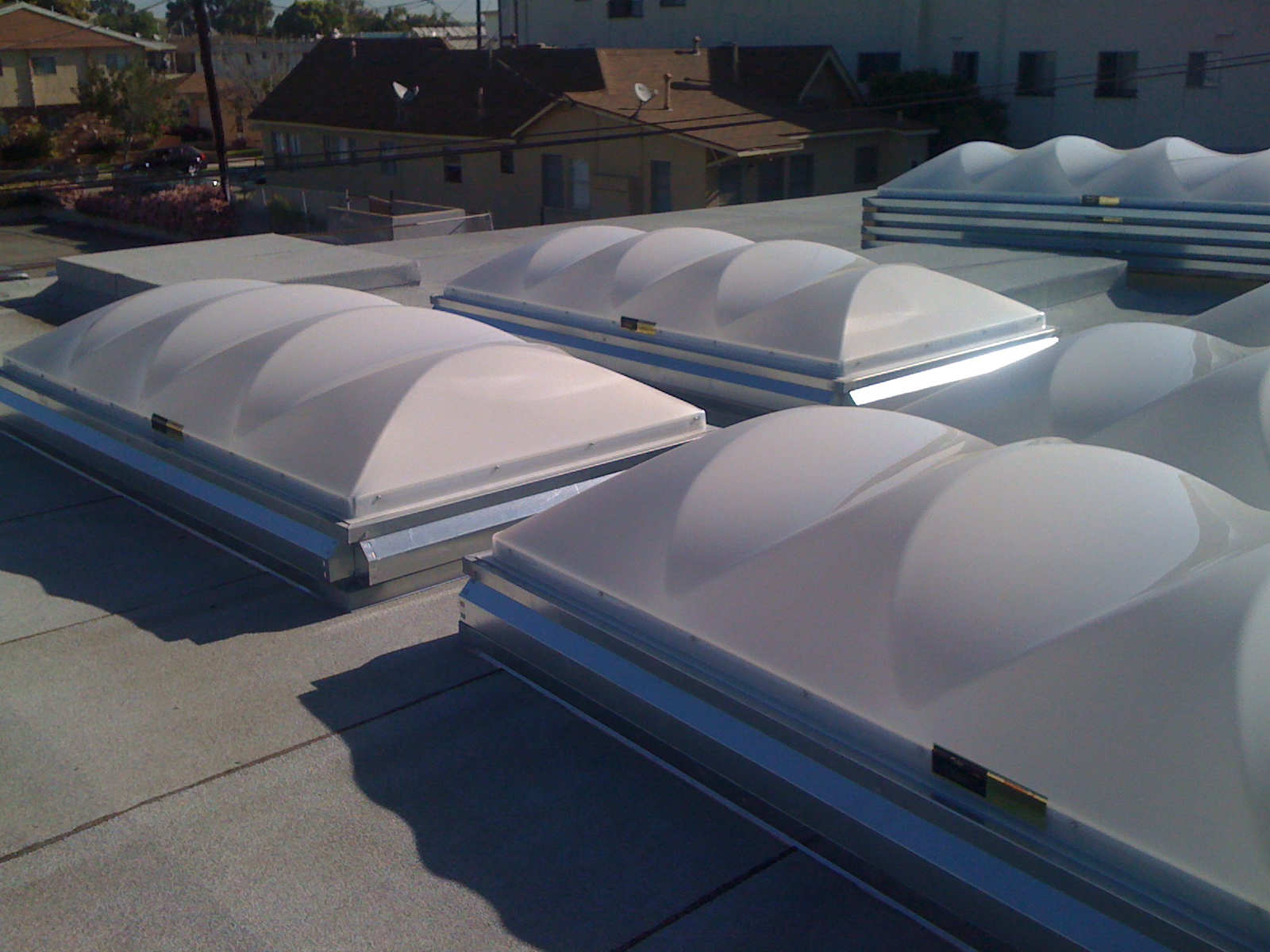  ​Skylights pending installation on capsheet roof 
