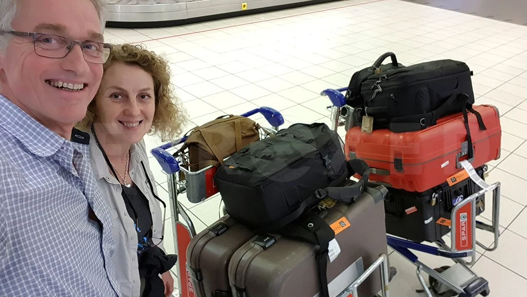 Us with travel gear.jpg