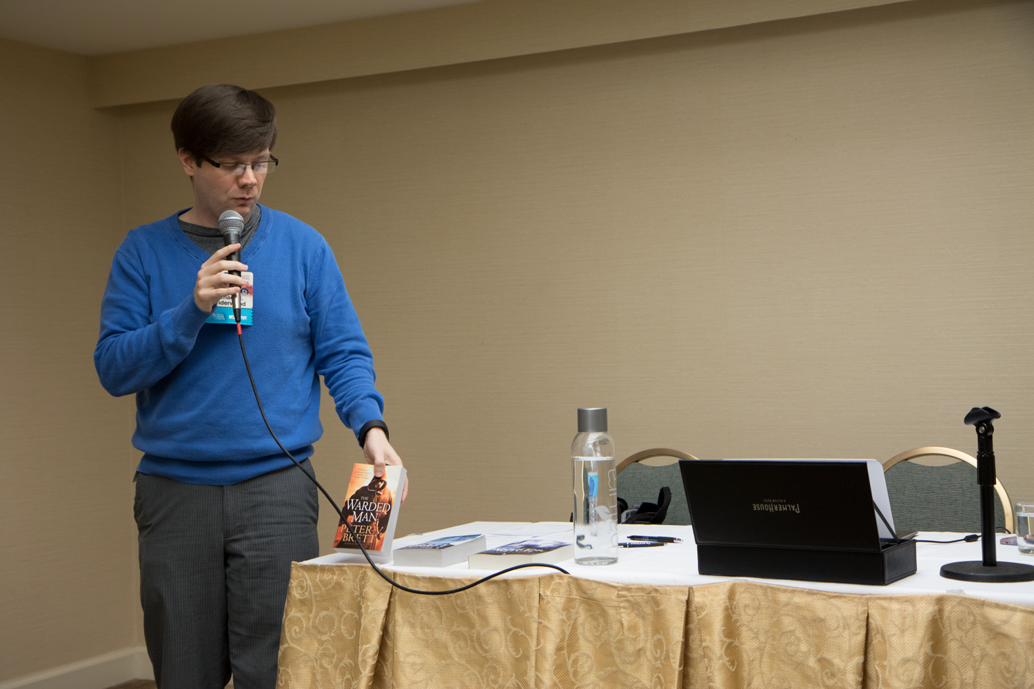 Mike Underwood demonstrating product placement for table sales.