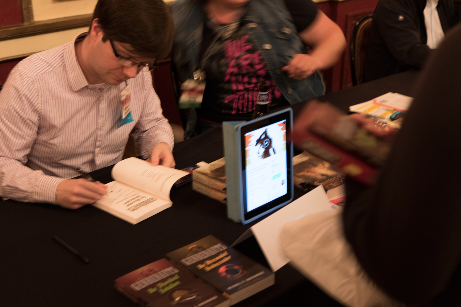 Walking the walk: At the author signing Mike attracted attention to his table using an ipad displaying his active kickstarter. 