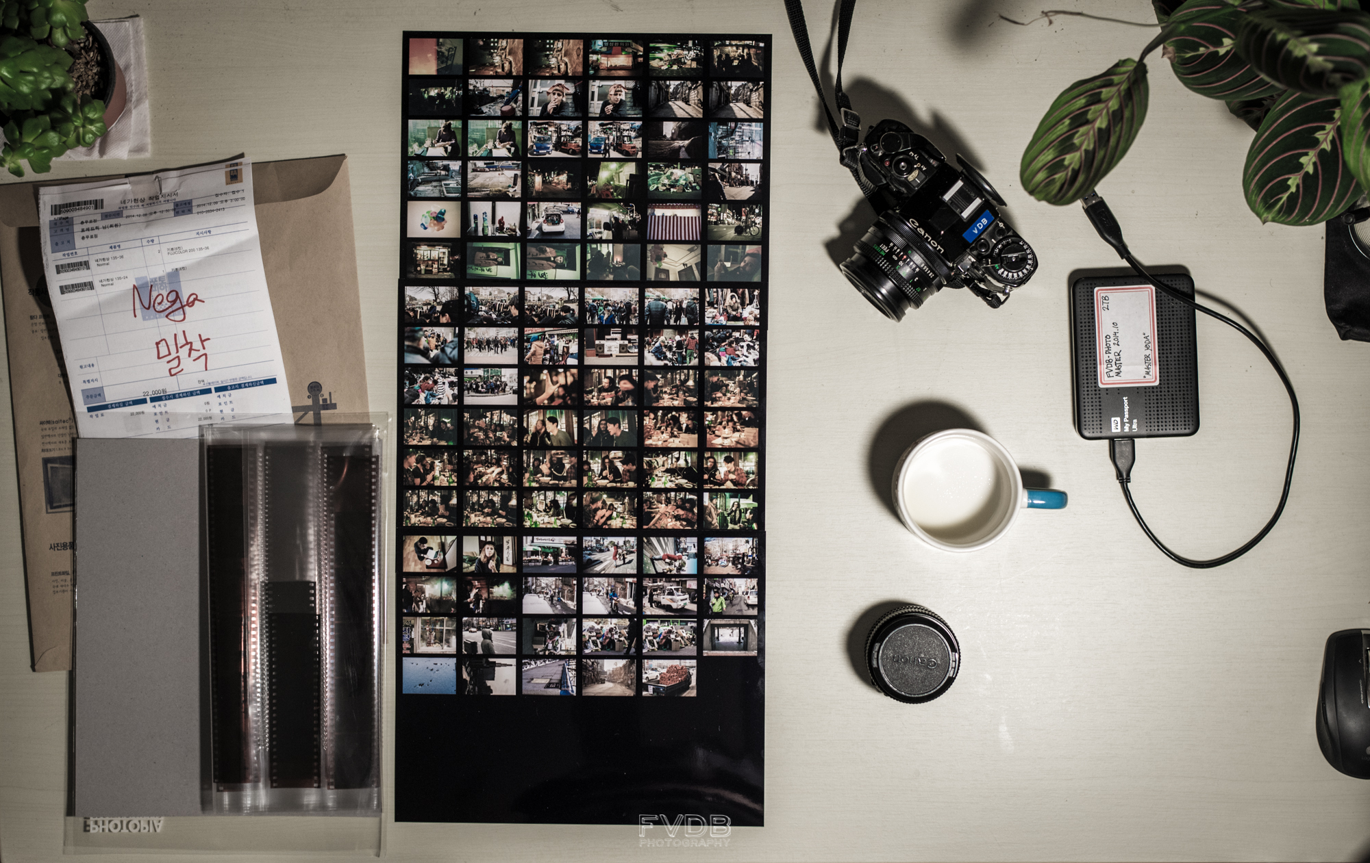 Three rolls & contact sheets developed in Korea by Photopia, for 21.000 KRW. Highly recommendable.